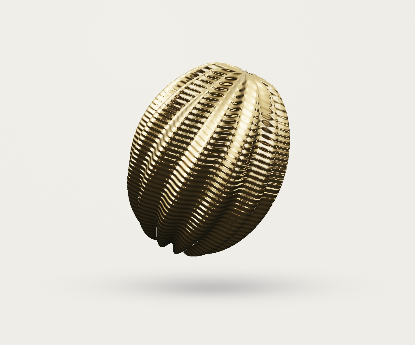 Solstice: a softly lobed, ribbed gold object with deep sculpted grooves.